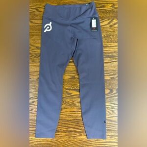 NWT- Peloton x Nike One Luxe Tight Fit, Mid Rise in Purple, Size Large.